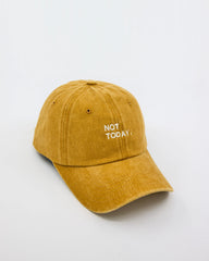 side view of Mustard Washed Cap with Not Today embroidered in white
