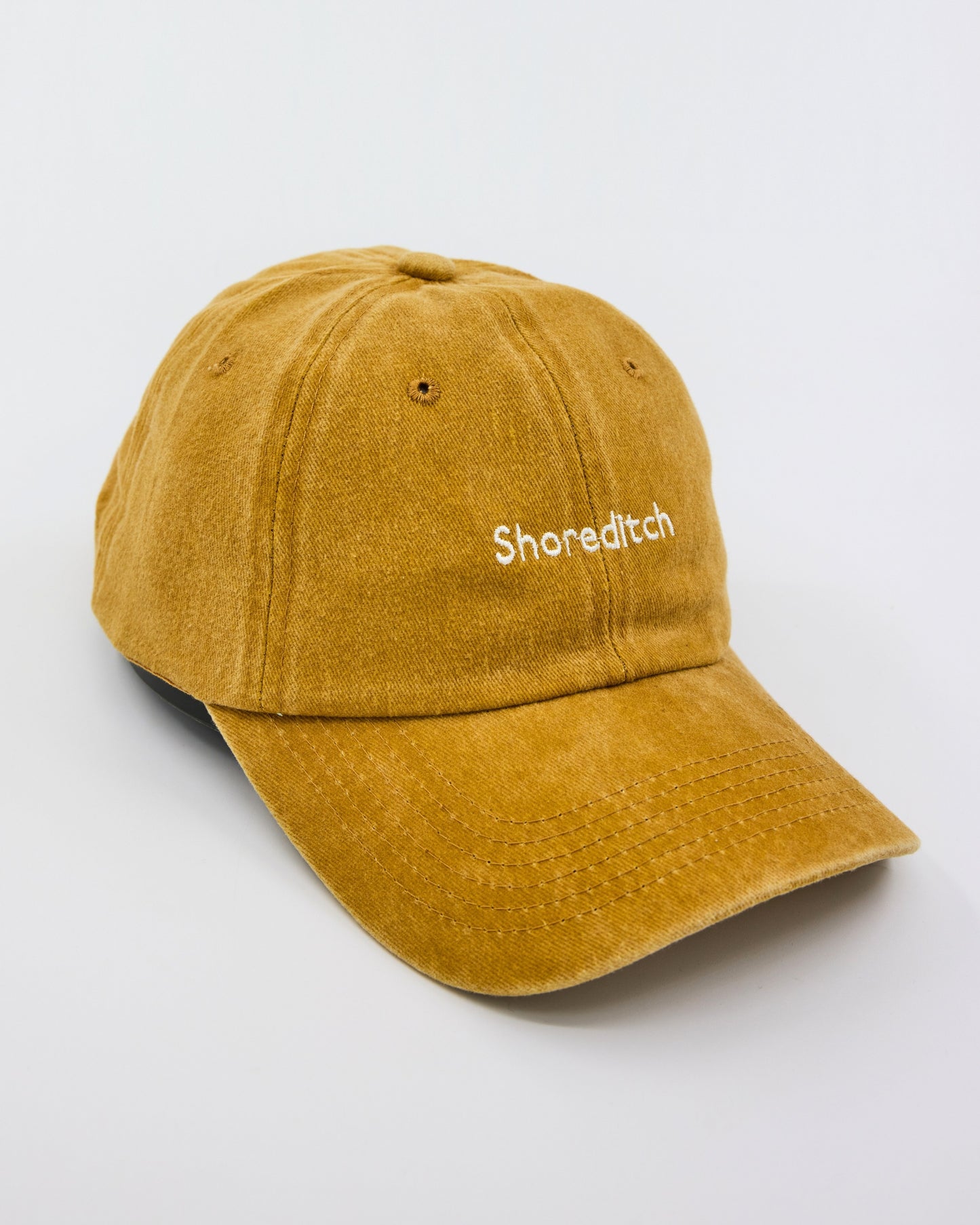 side view of Shoreditch Mustard Washed Cap