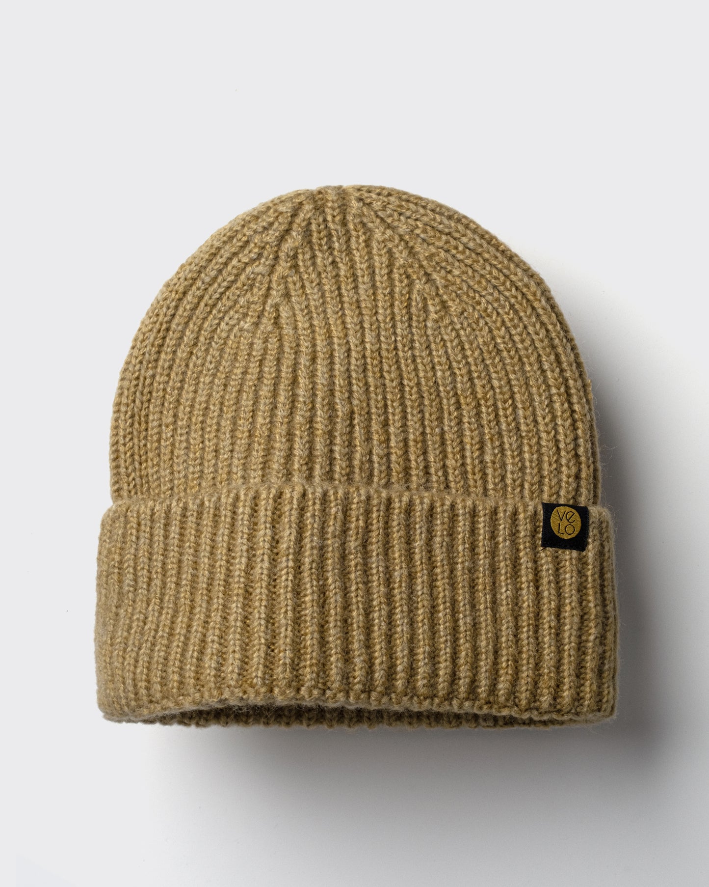 Mustard Yellow Lux Beanie on a light gray background