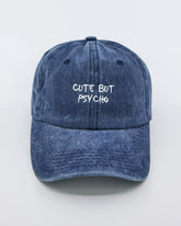 front view of Cute But Psycho Navy Blue Washed Cap