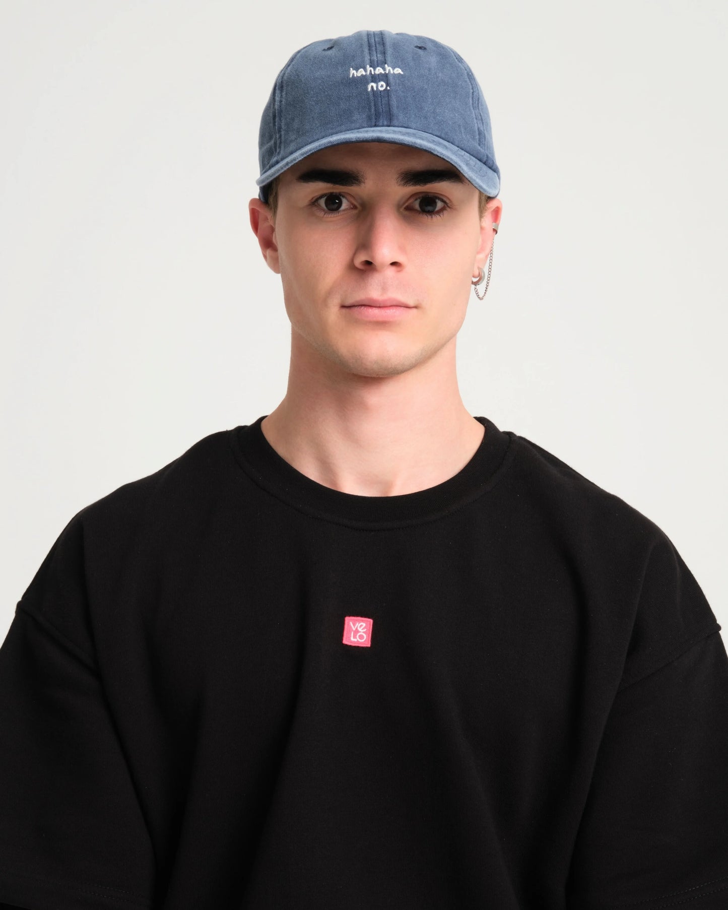 man wearing Navy Blue Hahaha No Washed Cap