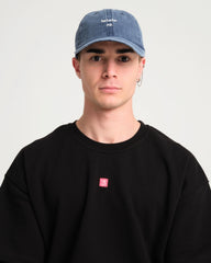 man wearing Navy Blue Hahaha No Washed Cap