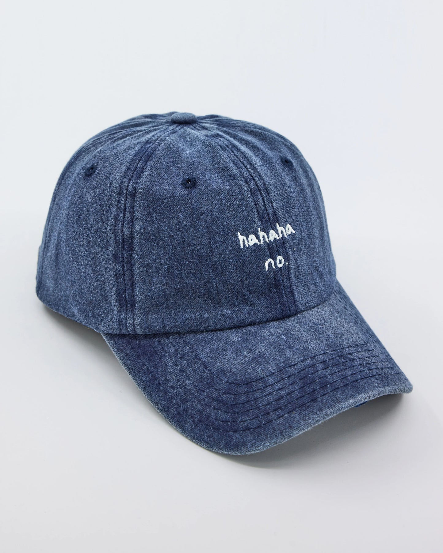 side view of Navy Blue Hahaha No Washed Cap