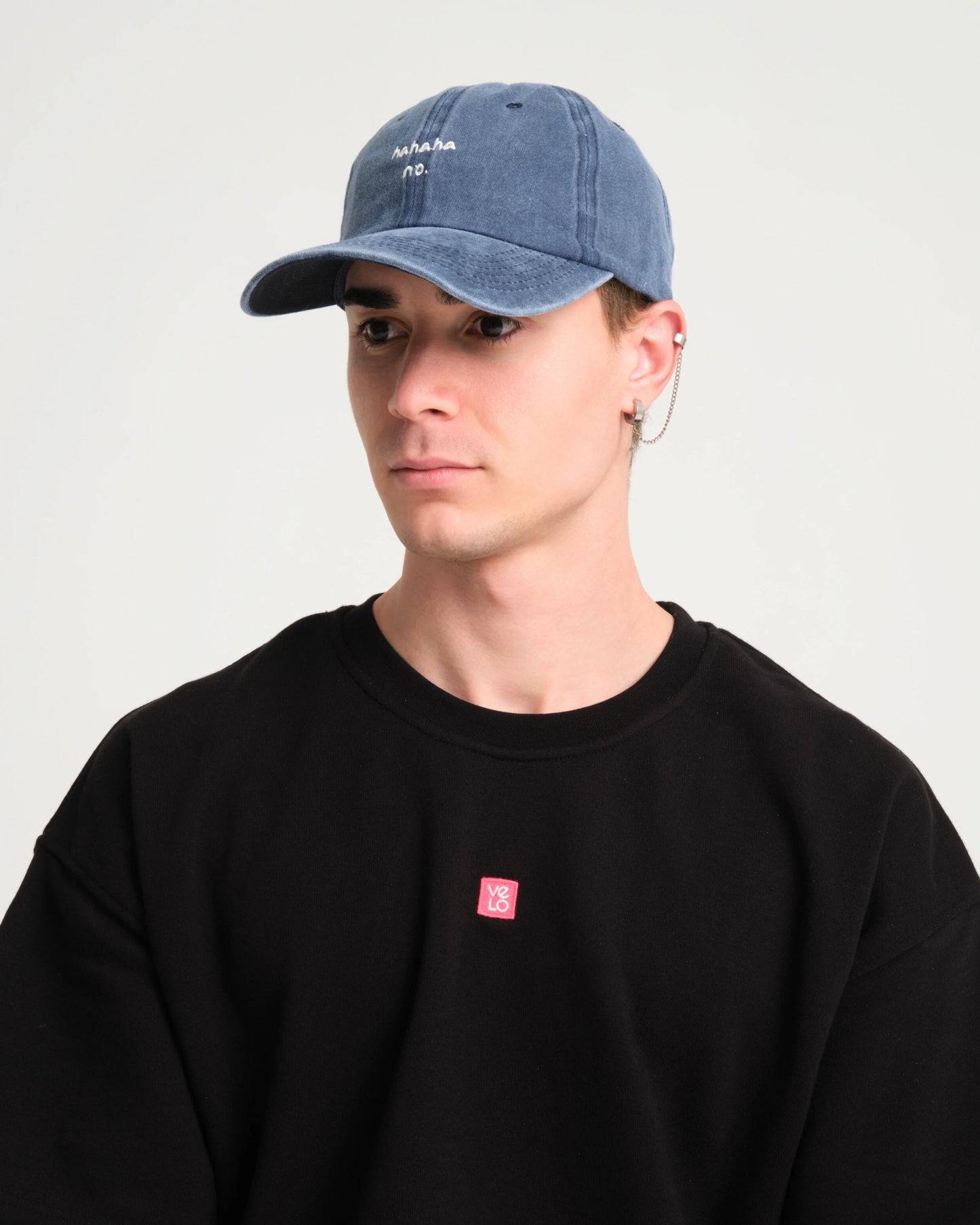 man wearing Navy Blue Hahaha No Washed Cap