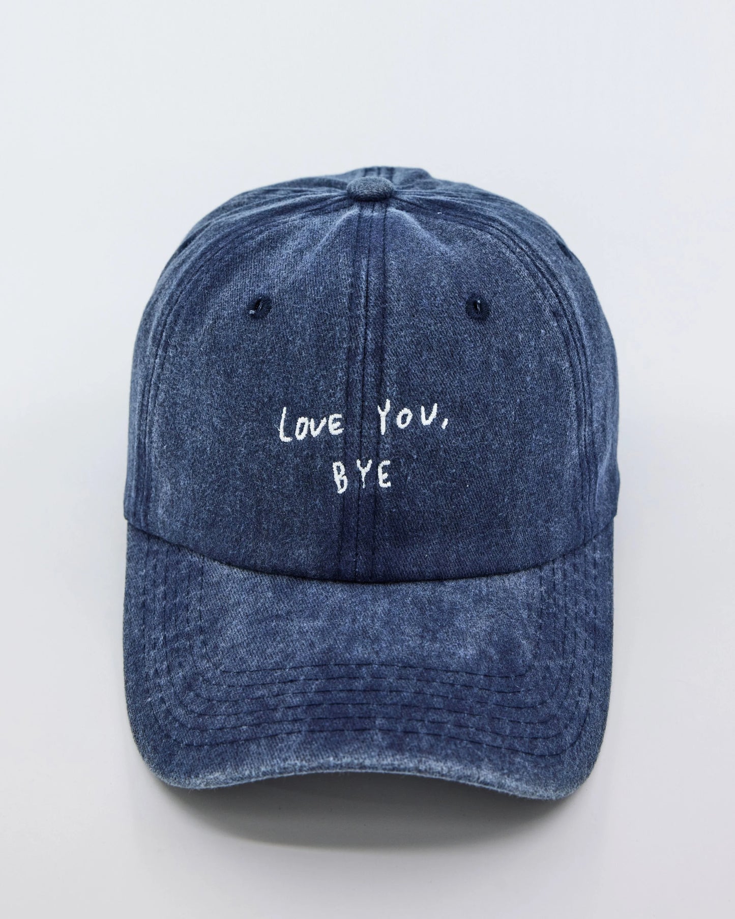 front view Navy Blue Washed Cap with Love You Bye embroidered in white