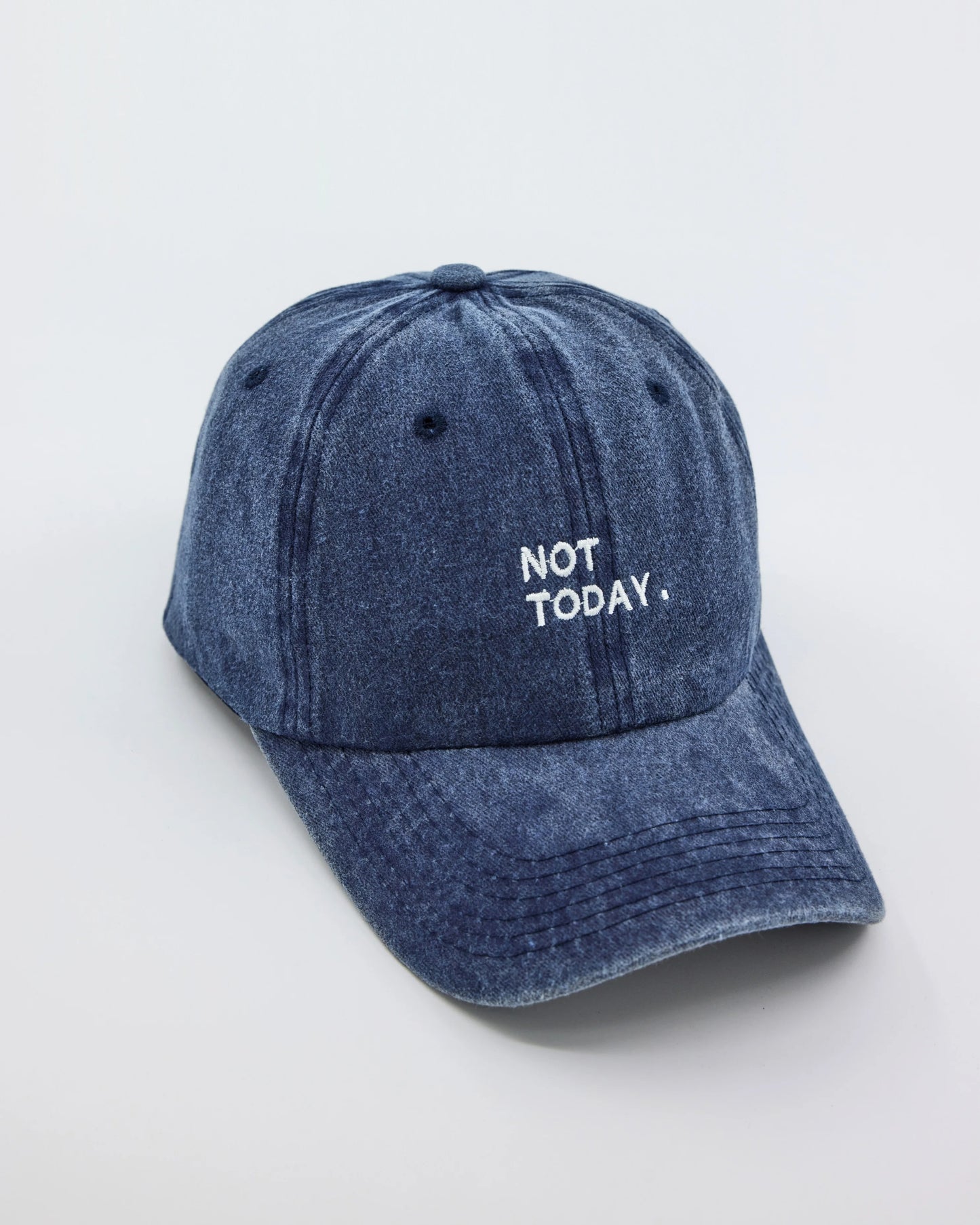 side view of Navy Blue Washed Cap with Not Today embroidered in white