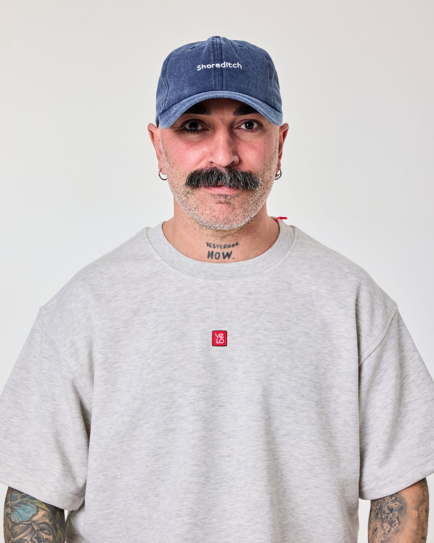 man wearing Navy Blue Shoreditch Washed Cap