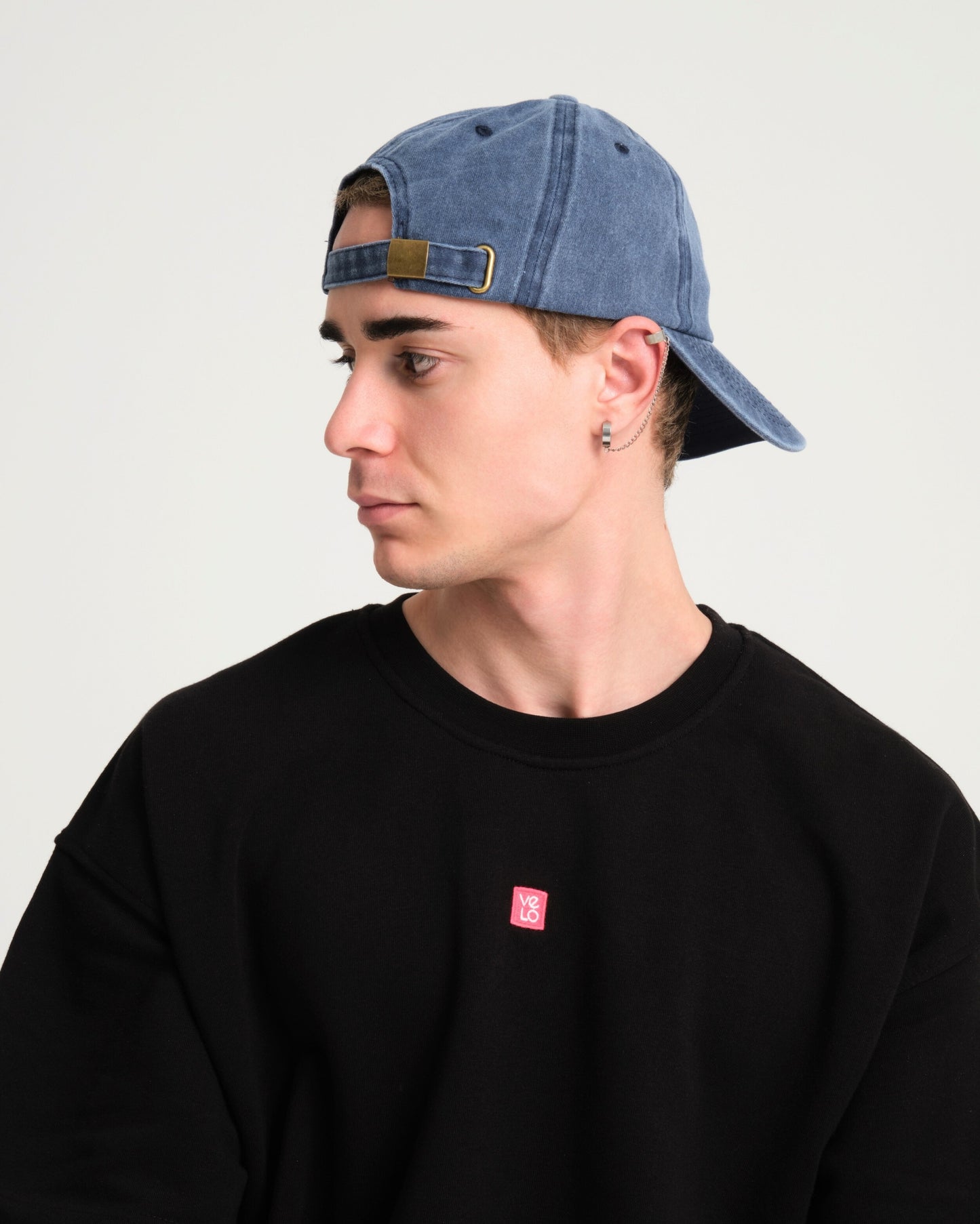 man wearing Navy Blue Shoreditch Washed Cap Hat
