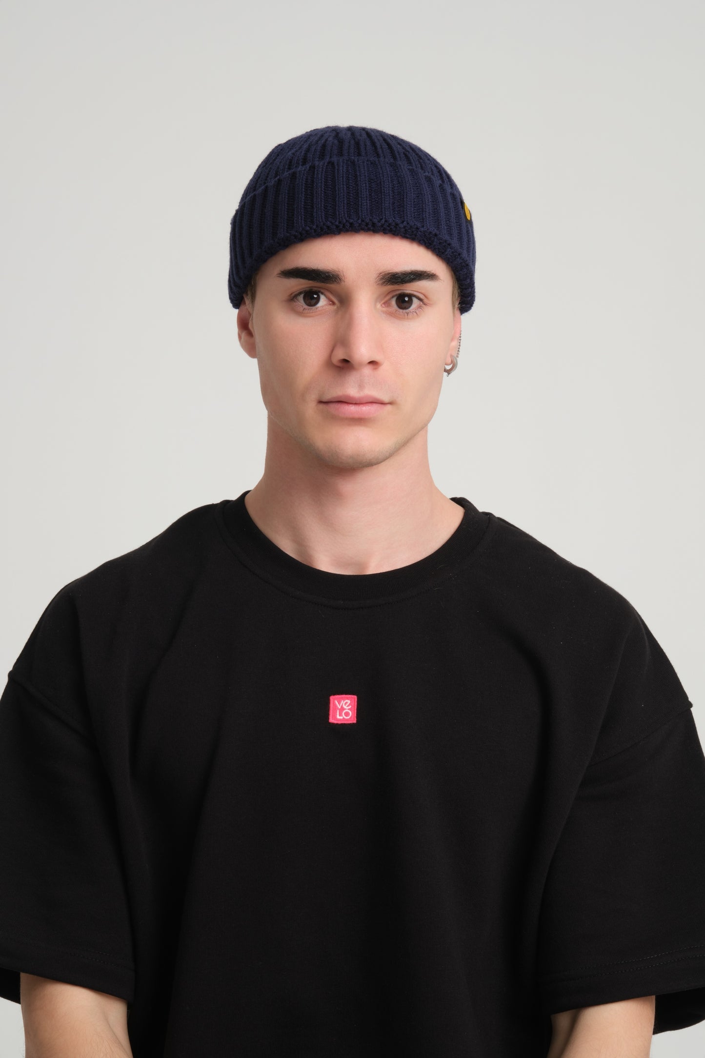 front view of a man wearing Navy Fisherman Beanie