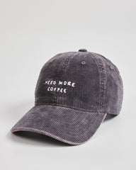 Gray cap with 'Need More Coffee' text on a light gray background