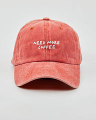Front view of Need More Coffee Orange Washed Cap