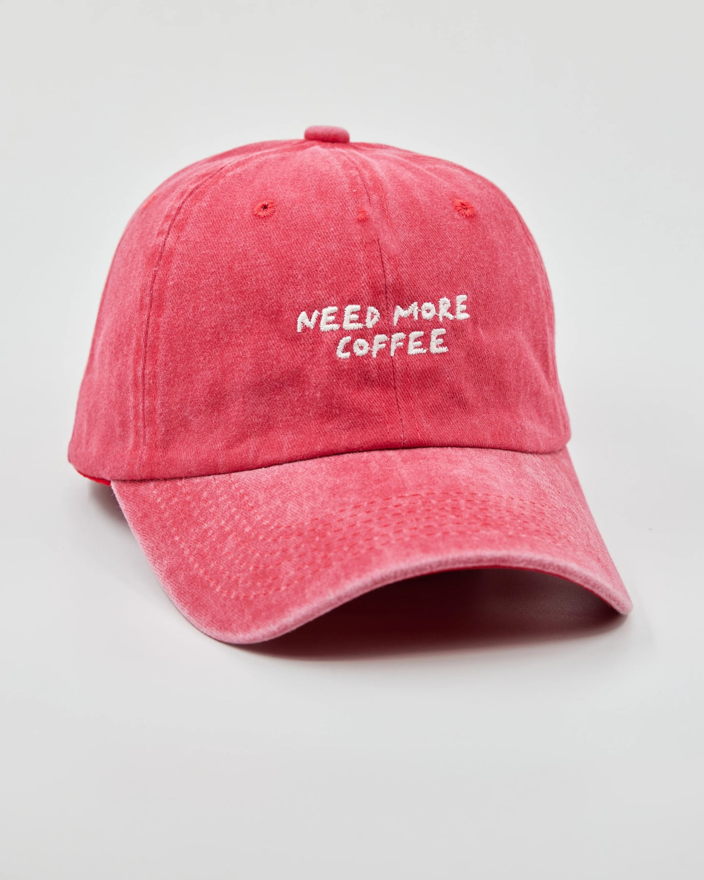 Side view of Need More Coffee Red Washed Cap