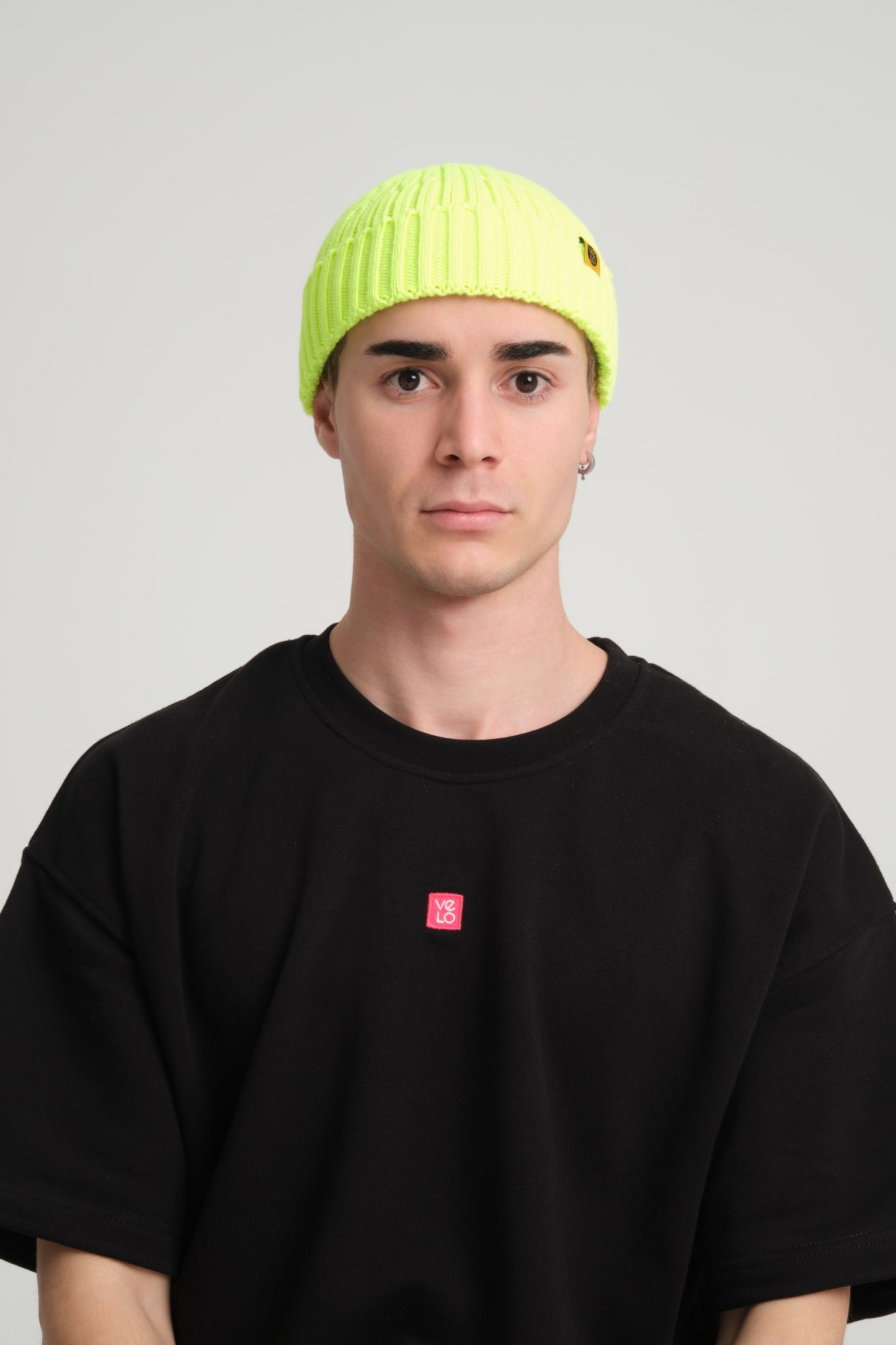front view of a man wearing Neon Yellow Fisherman Beanie