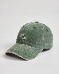 Green cap with 'Not Today' text on a light gray background