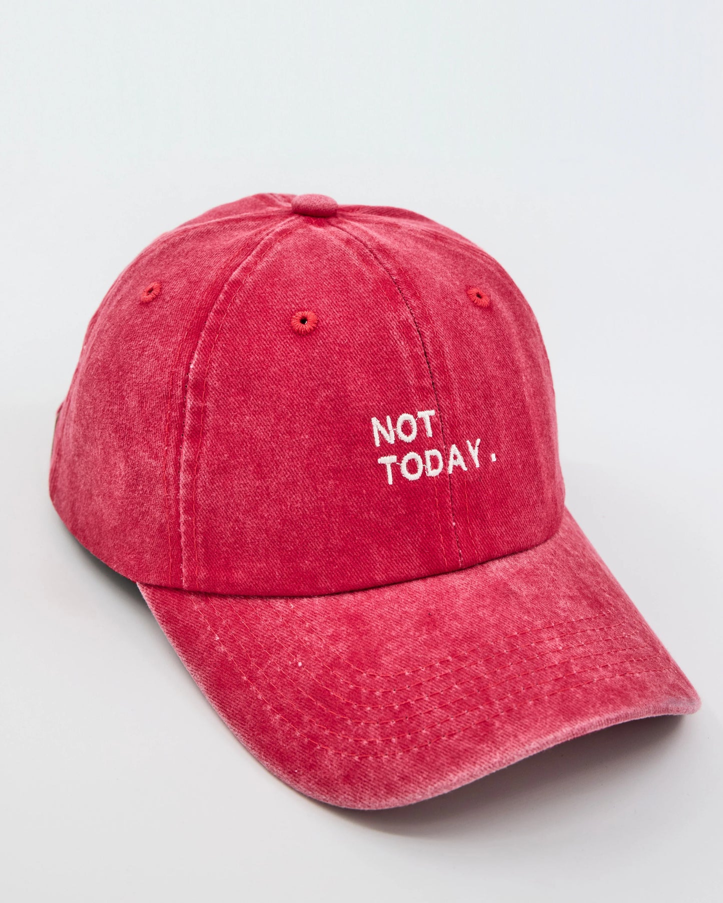 side look of not today red washed cap