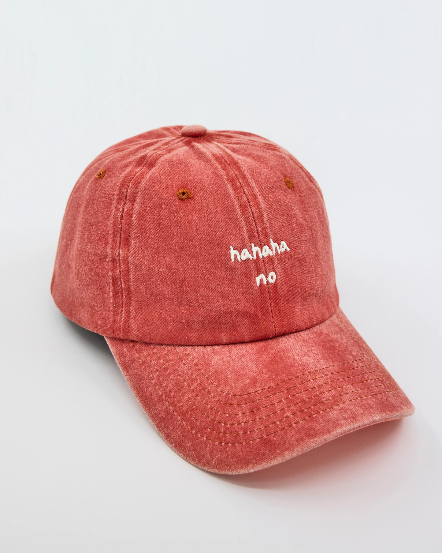 side view of Orange Hahaha No Washed Cap