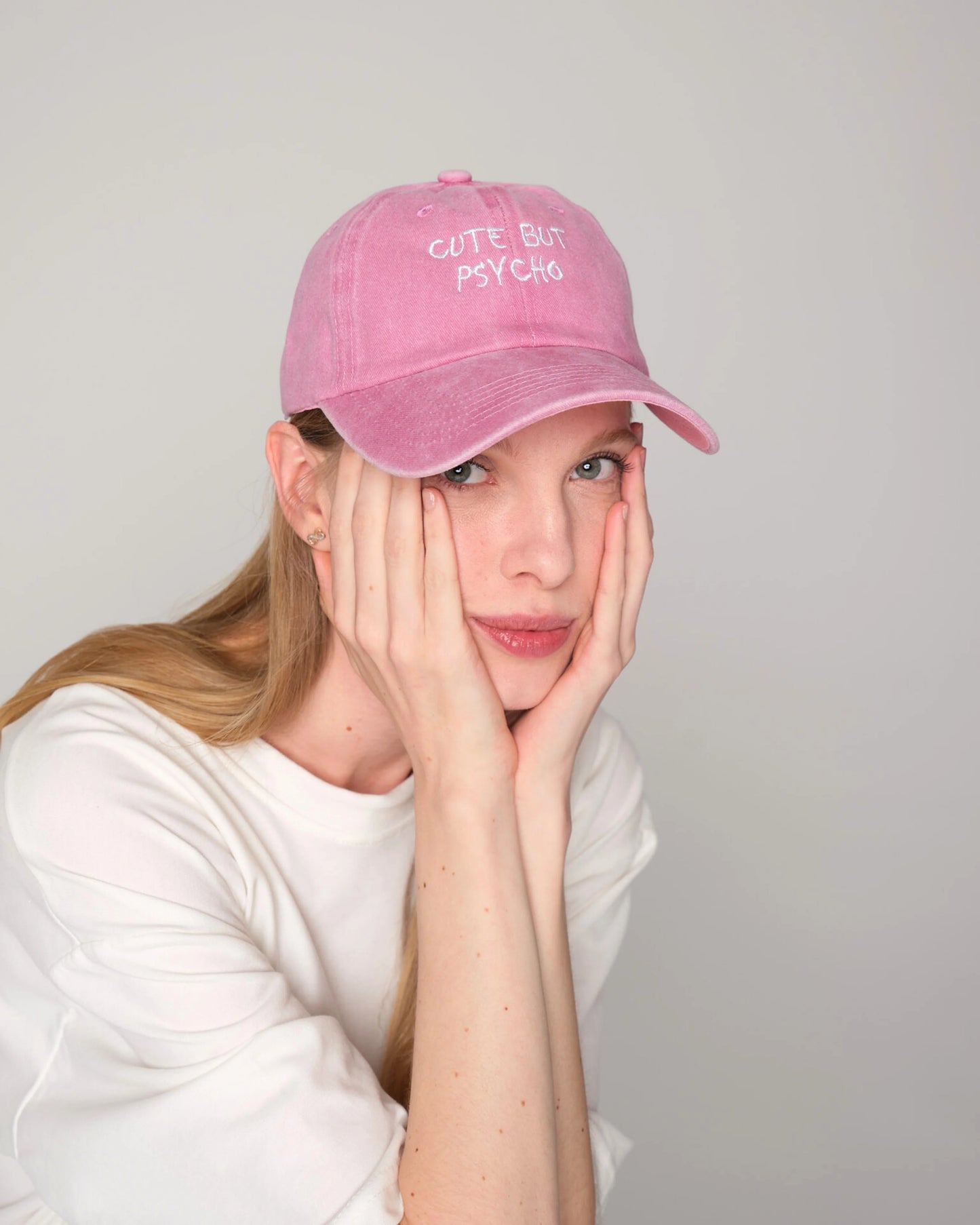 women wearing Pink Cute But Psycho Washed Cap