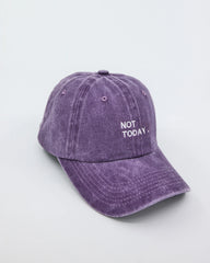 side view of Purple Washed Cap with Not Today embroidered in white