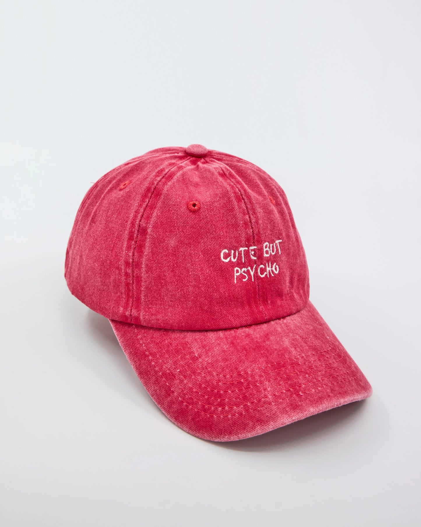 side view of Cute But Psycho Red Washed Caps