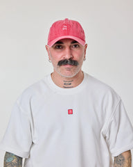 man wearing Red Love Myself Washed Cap