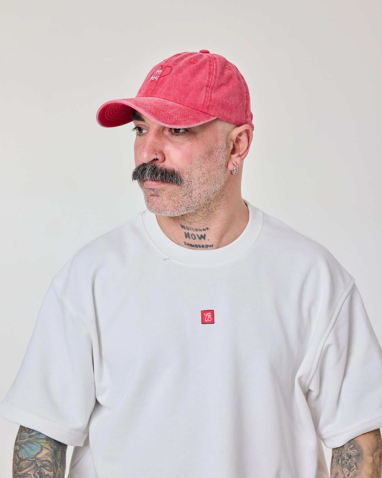 man wearing Red Love Myself Washed Cap
