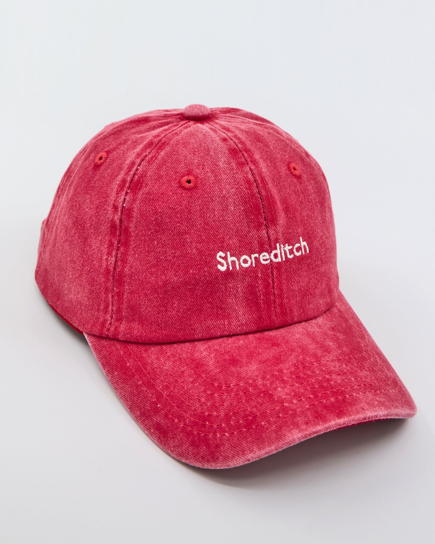 side view of Shoreditch Red Washed Cap