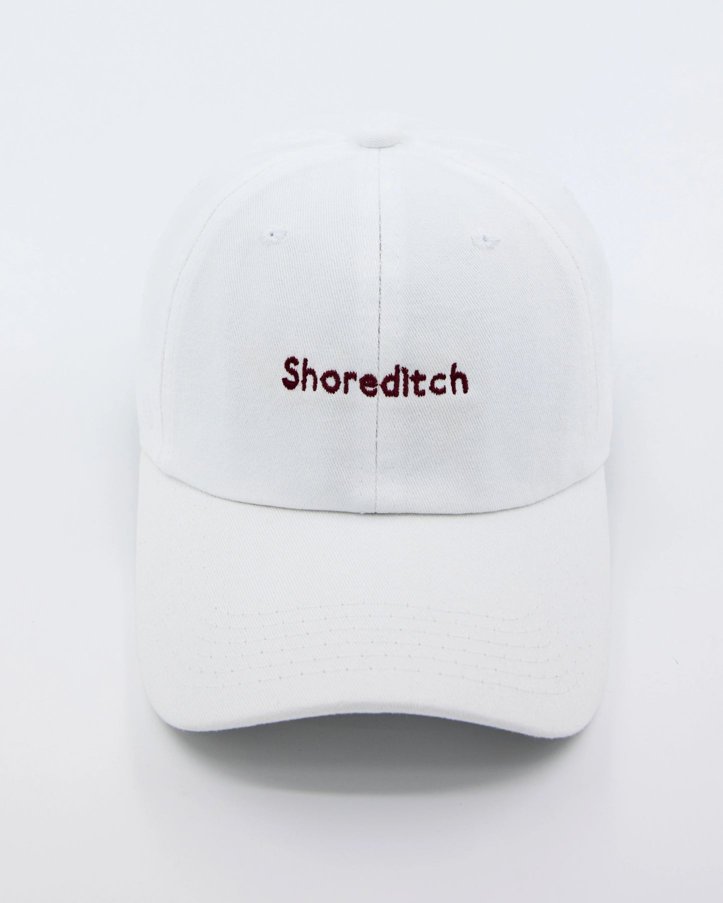 front look of shoreditch embroidered white cap