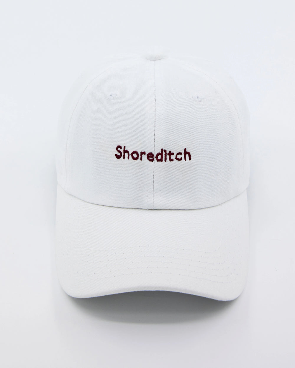 front look of shoreditch embroidered white cap