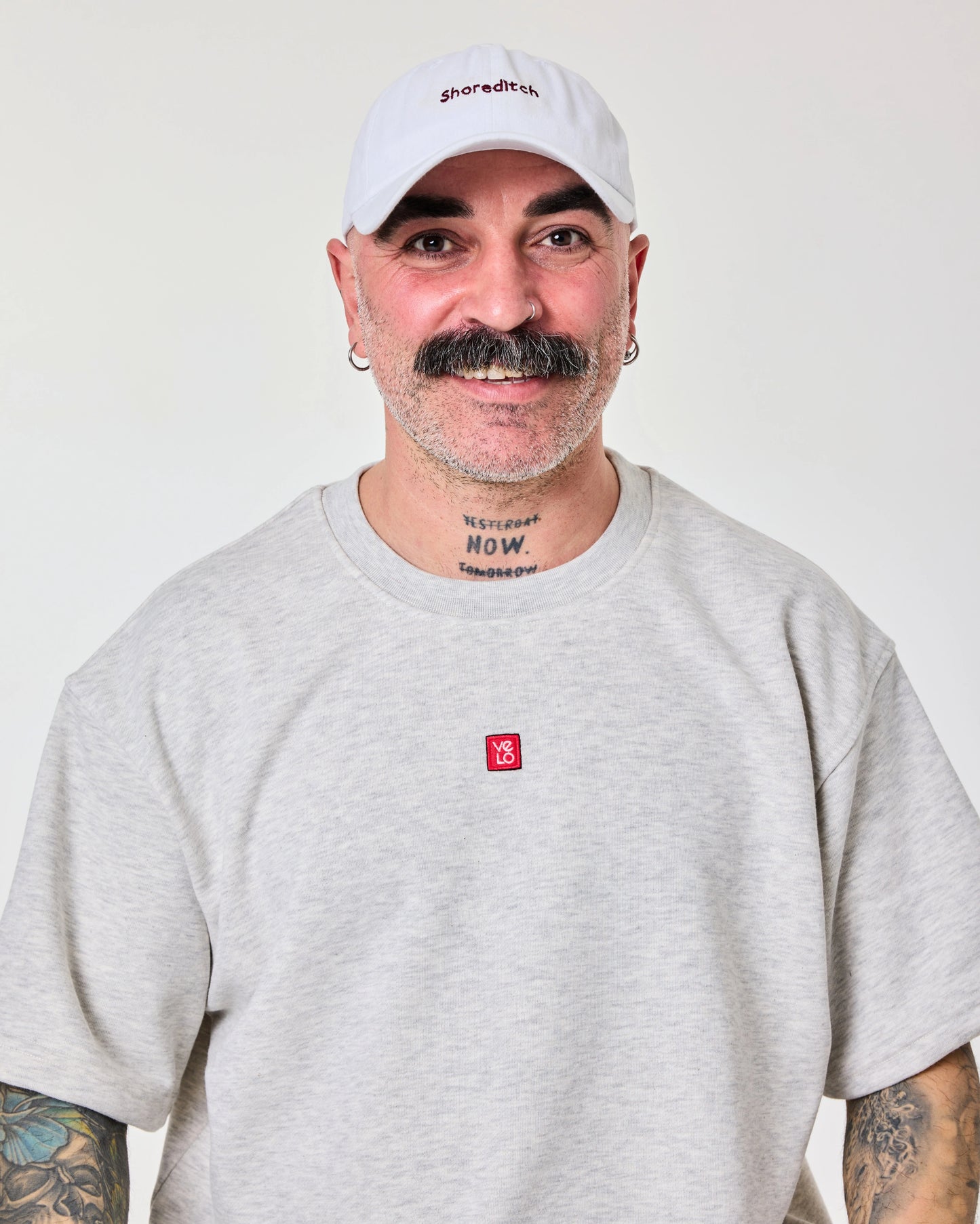 front look of male model wearing Shoreditch embroidered white cap