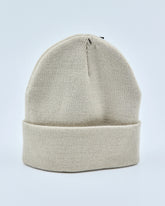 stone white beanie on a light gray background