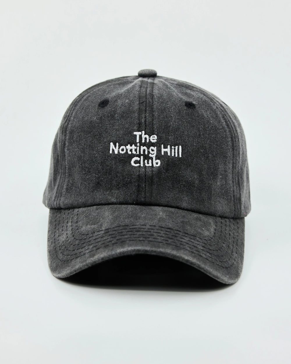 Front view of The Notting Hill Club Black Washed Cap