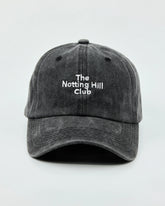 Front view of The Notting Hill Club Black Washed Cap