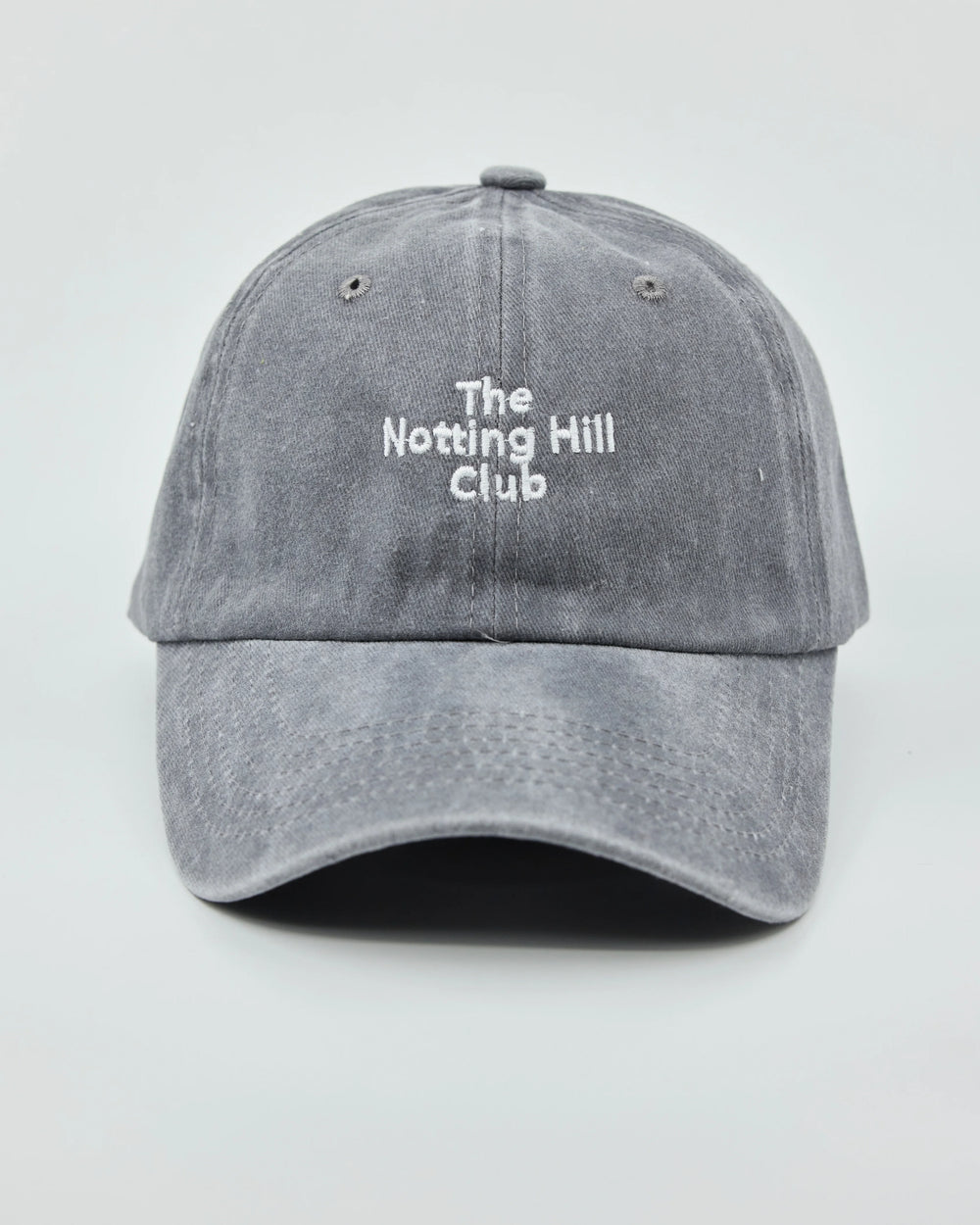 Front view of The Notting Hill Club Light Gray Washed Cap