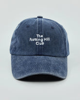 Front view of The Notting Hill Club Navy Washed Cap