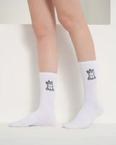 side view of white unicorn socks