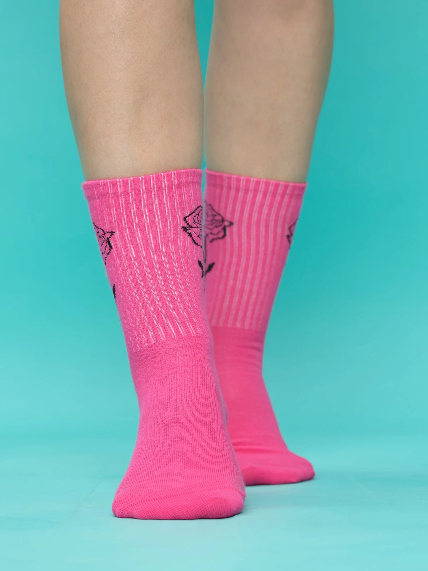 front view of pink rose socks