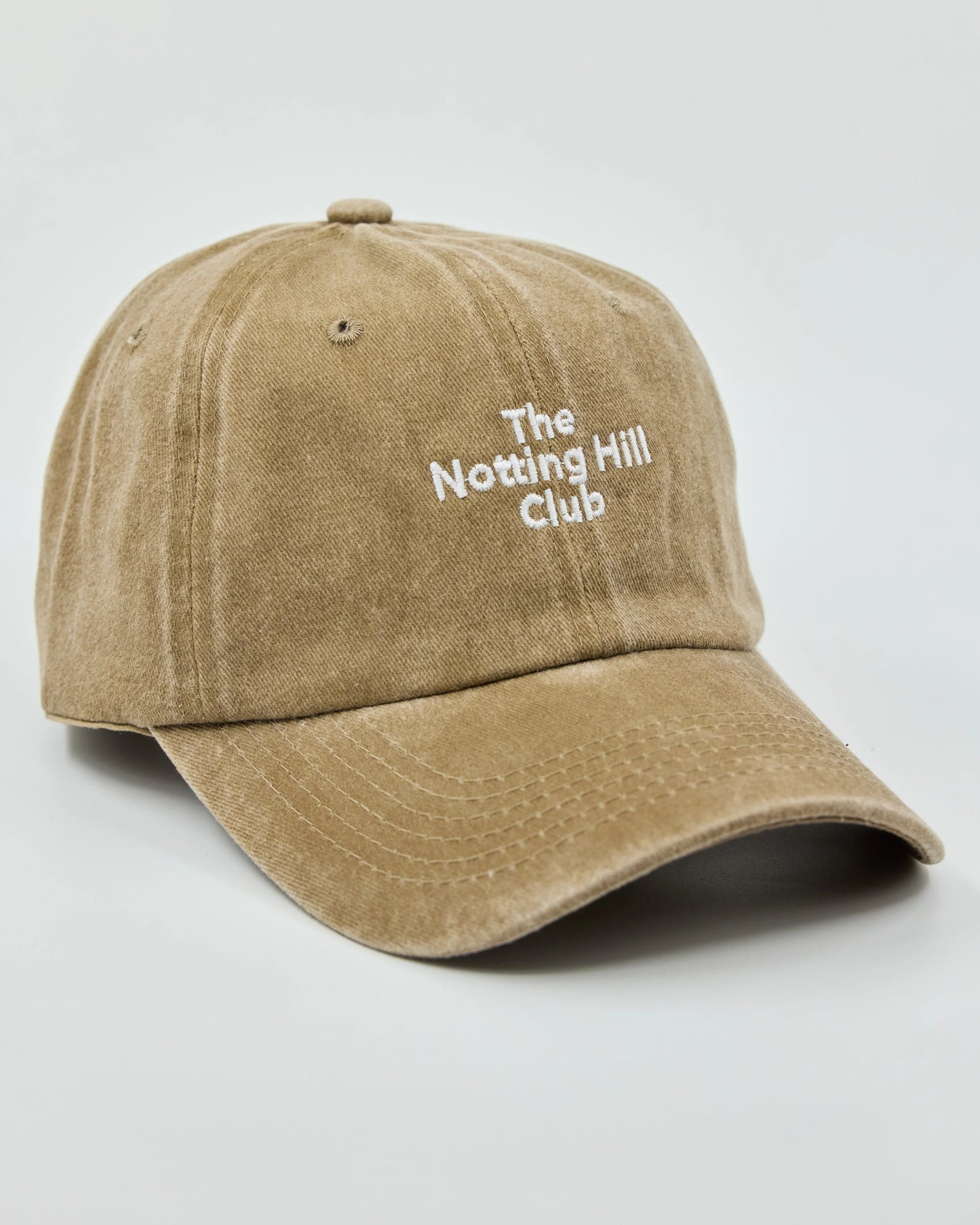 Front view of The Notting Hill Club Beige Washed Cap