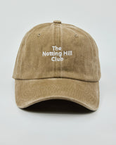 Front view of The Notting Hill Club Beige Washed Cap
