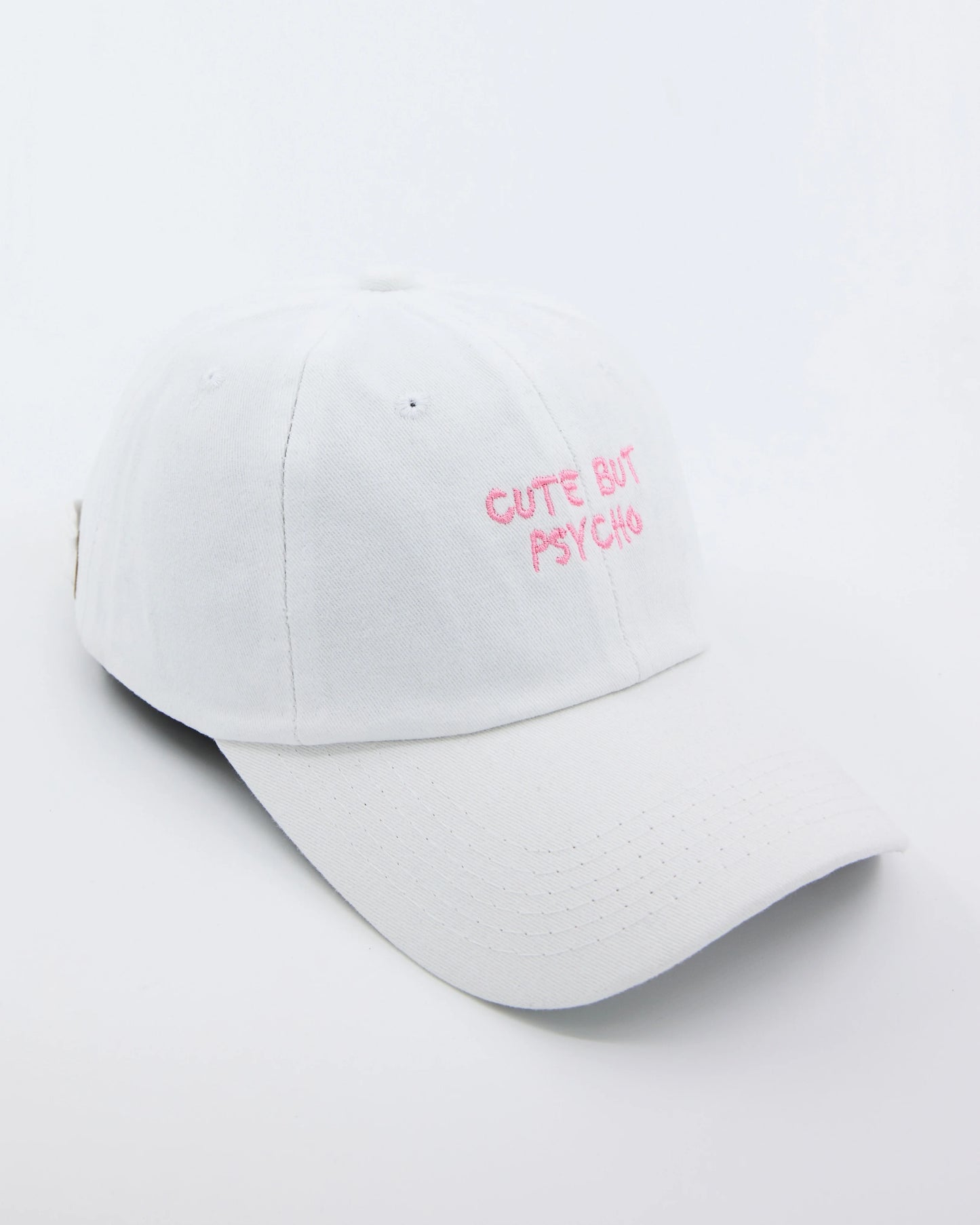 side view of Cute But Psycho White Washed Cap