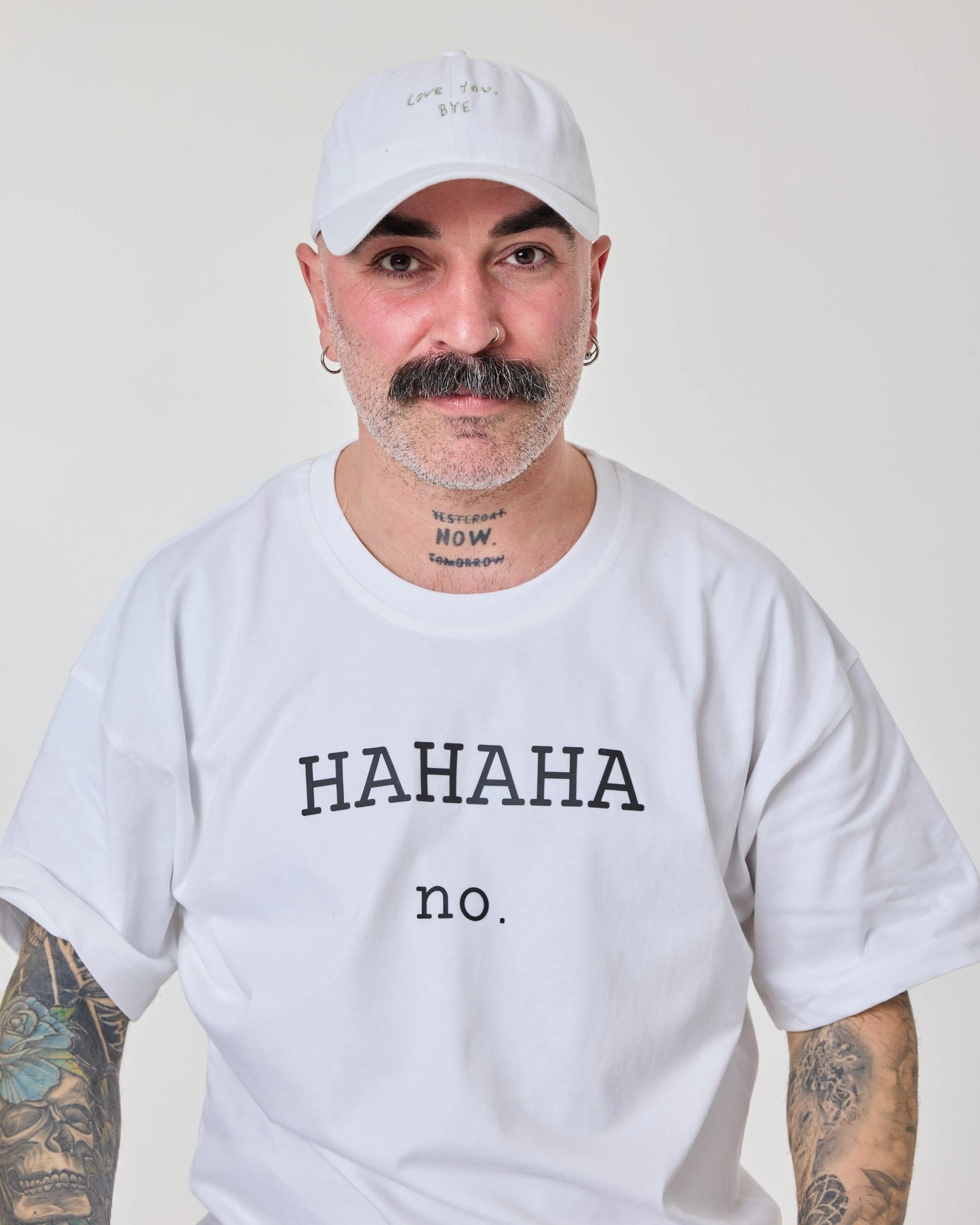 man wearing Love You Bye White Washed Cap