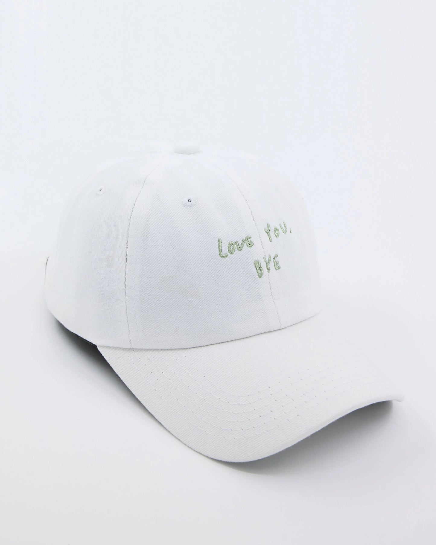 side view of Love You Bye White Washed Cap