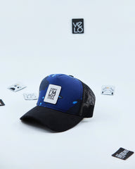 Side view of Blue Camo and Black Customisable Trucker Cap with patches