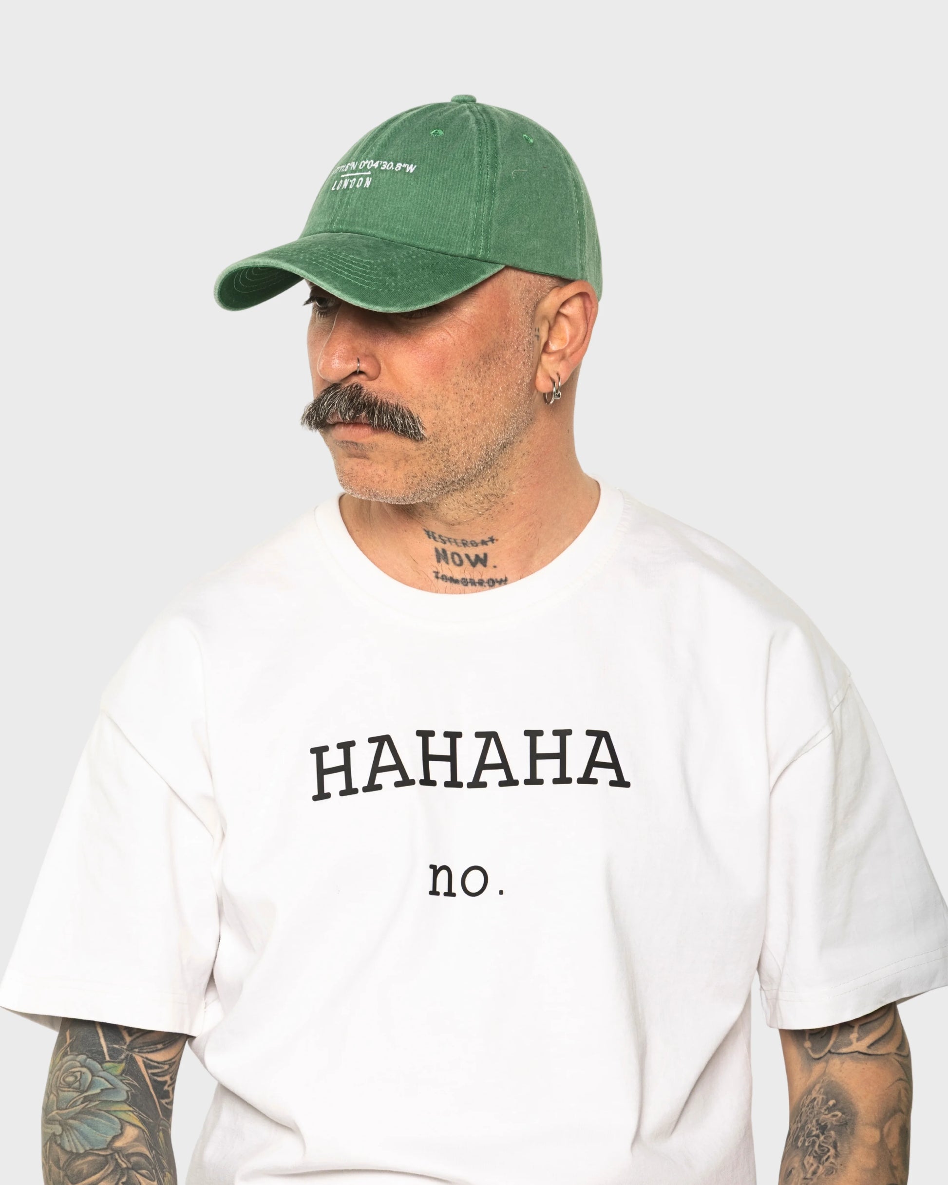 A man wearing the London Green Washed Cap