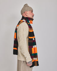 Brick Grid long acrylic scarf styled with cream knitwear, side view