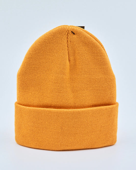 Amber yellow beanie on a light gray background