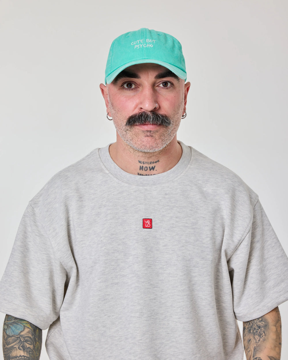 man wearing Cute But Psycho Aqua Blue Washed Caps