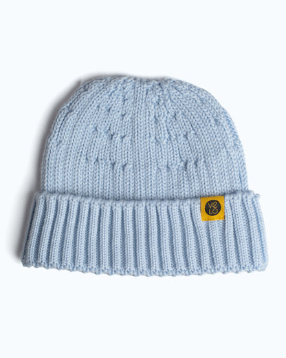 baby blue fisherman beanie on a white background