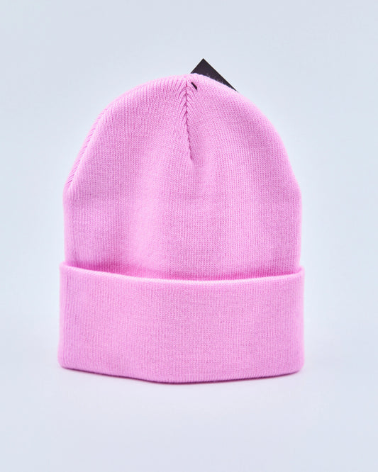 Baby pink beanie on a light gray background