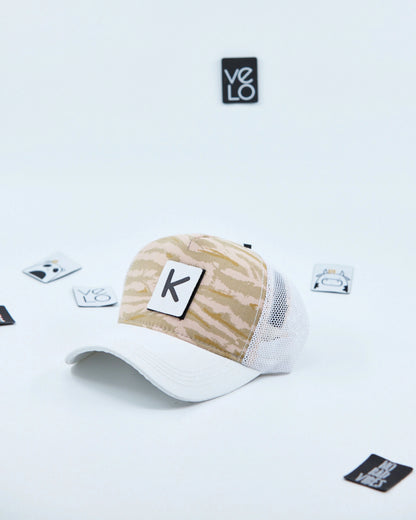 Side view of Beige Tiger and White Customisable Trucker Cap with patches