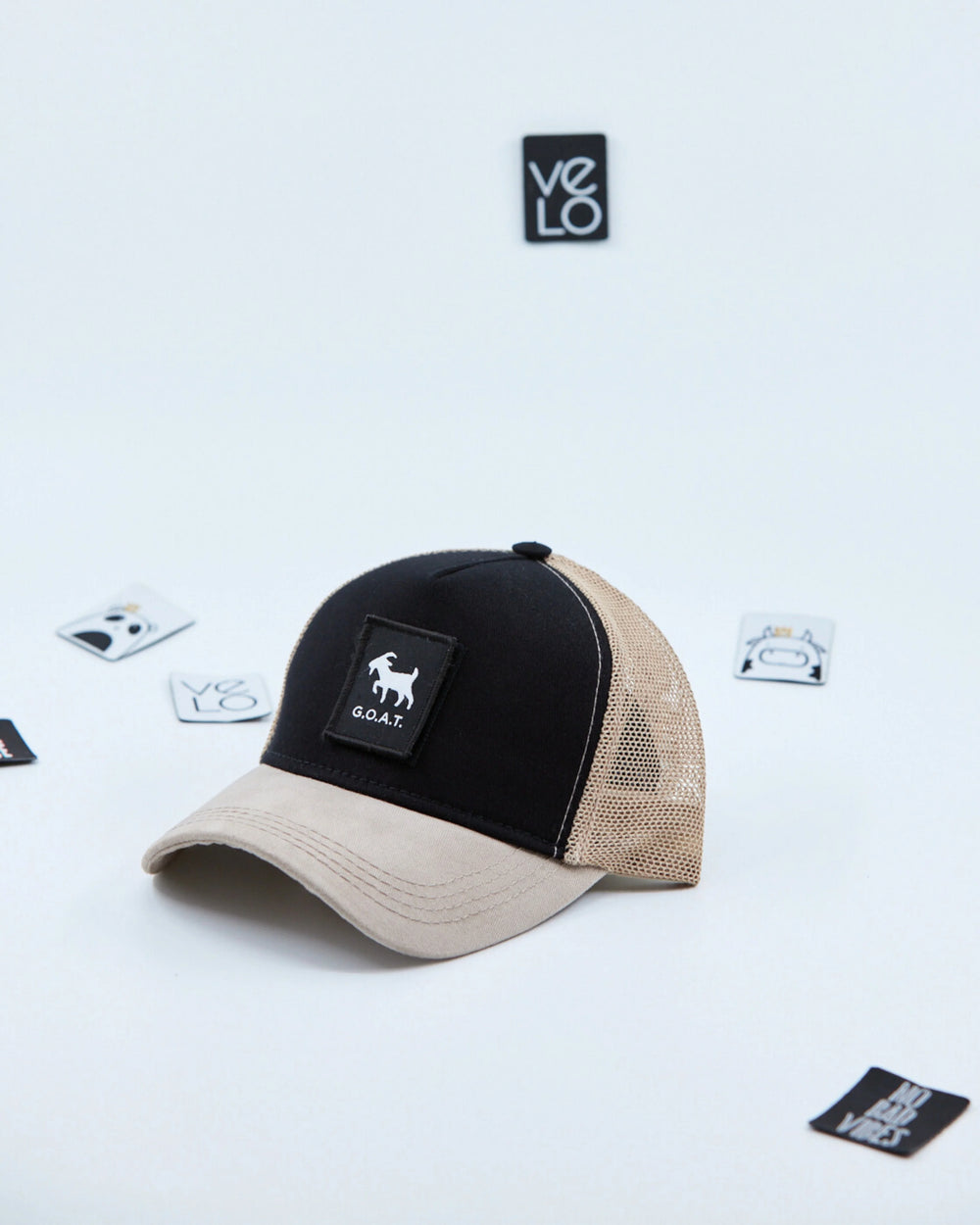 Side view of Black and Beige Trucker Cap with patches